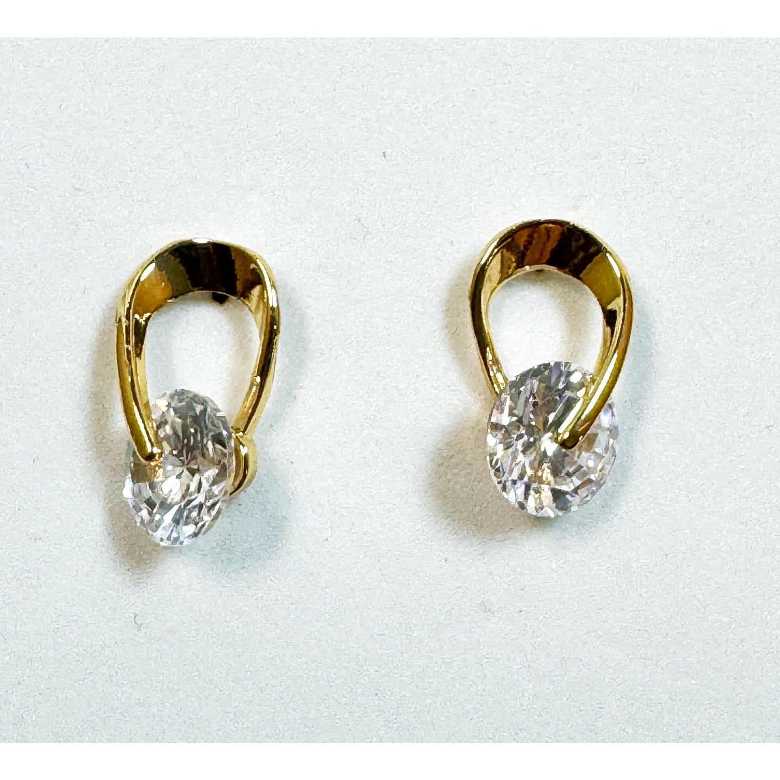 Gold Tone CZ Post Earrings Oval Cubic Zirconia Studs 5/8 x 3/8 Inch E294